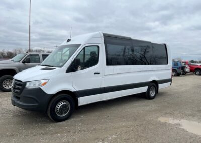 Exterior view of white pano specialty vehicle.