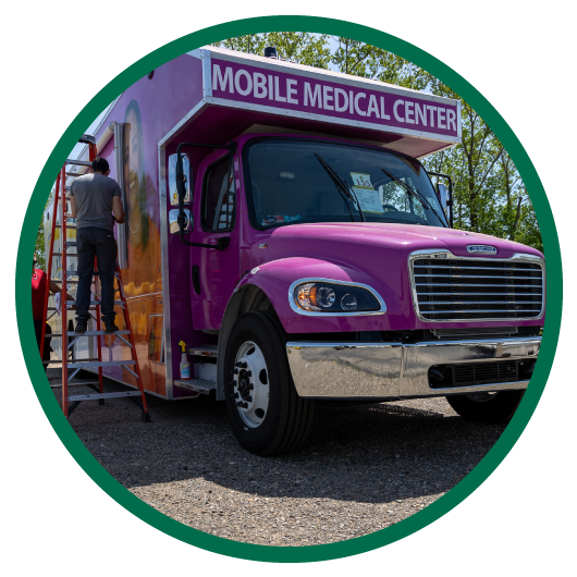 Round image of exterior of mobile medical center vehicle