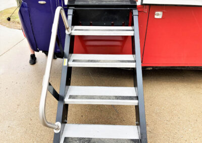 Exterior stairs going into blood mobile specialty vehicle.