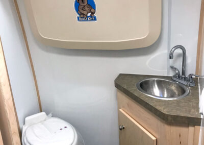 Interior bathroom of mobile cooking unit.