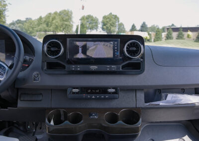 Dashboard display showing camera angles on screen of a TWR Specialty Vehicle.