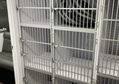 Pet crates inside of P.A.W.S mobile pet services vehicle