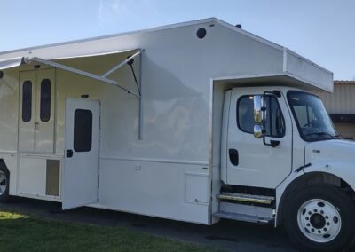 White exterior of large custom vehicle