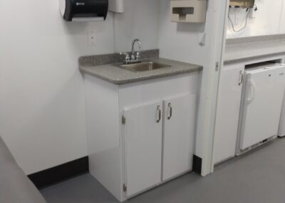 Sink and cabinets inside of vehicle