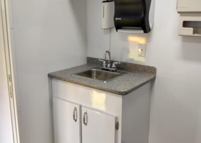 Sink and cabinets inside of vehicle