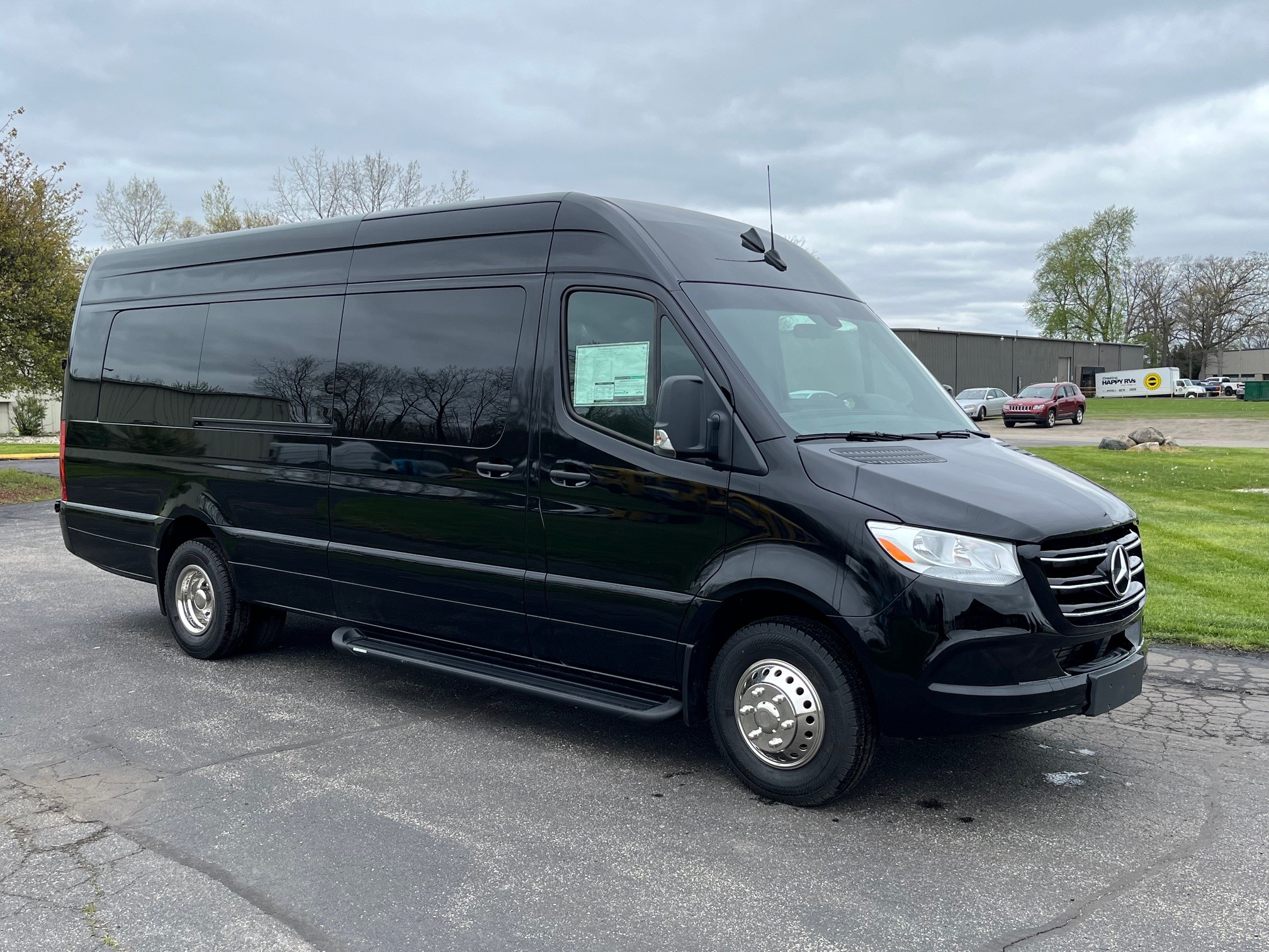 Black Mercedes-Benz specialty vehicle.