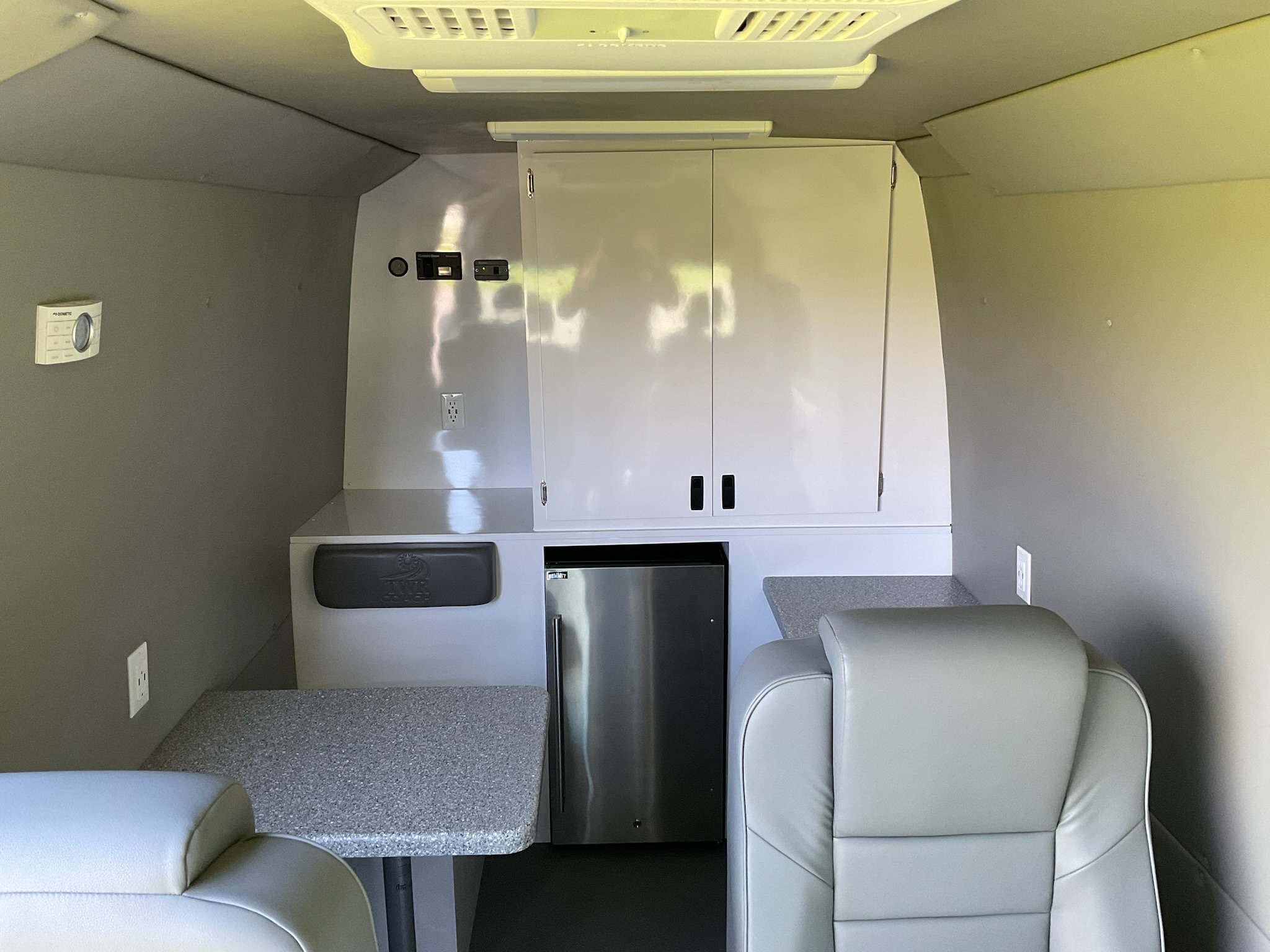 Interior meeting area inside a mobile marketing vehicle 